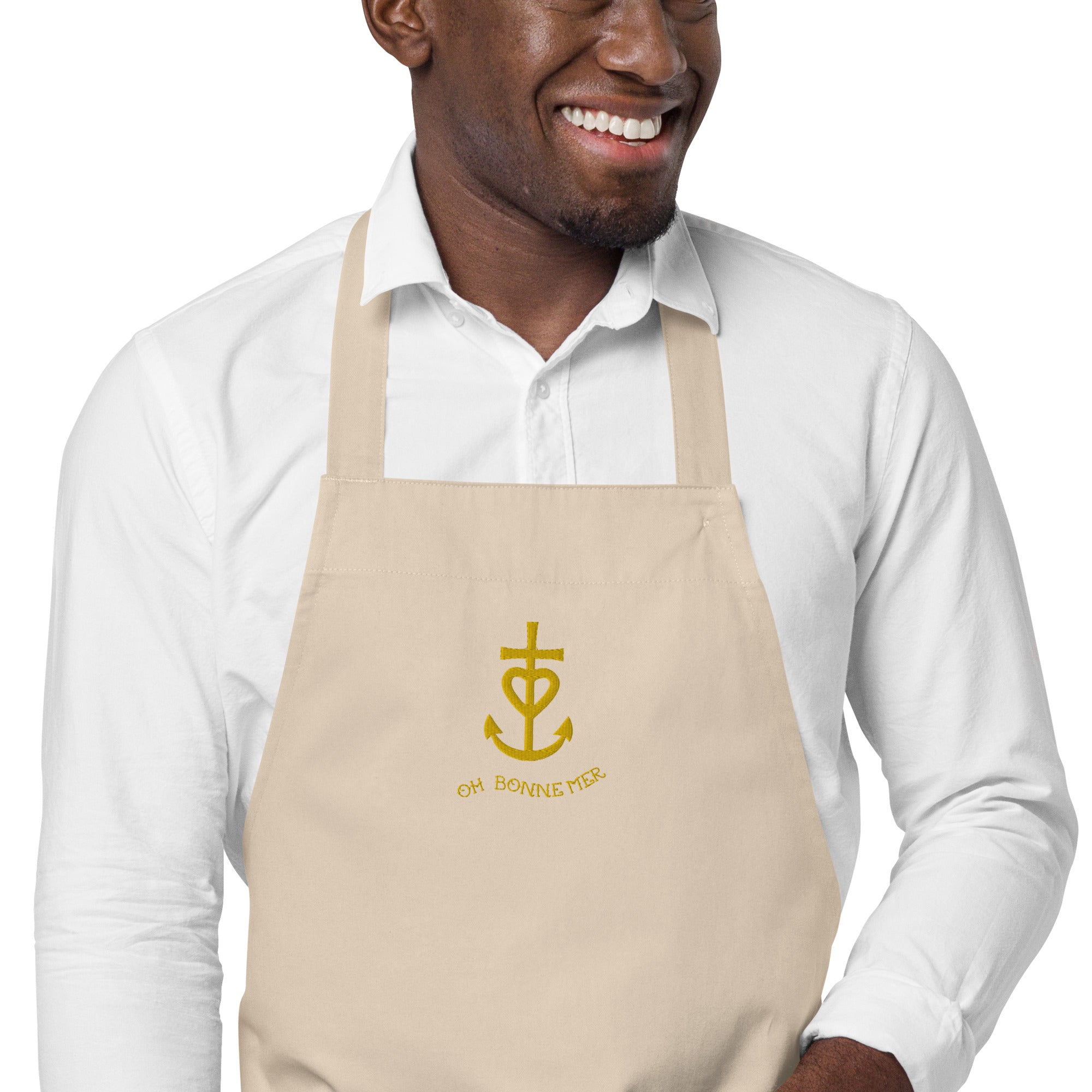 Organic cotton apron Camargue Cross gold embroidered pattern