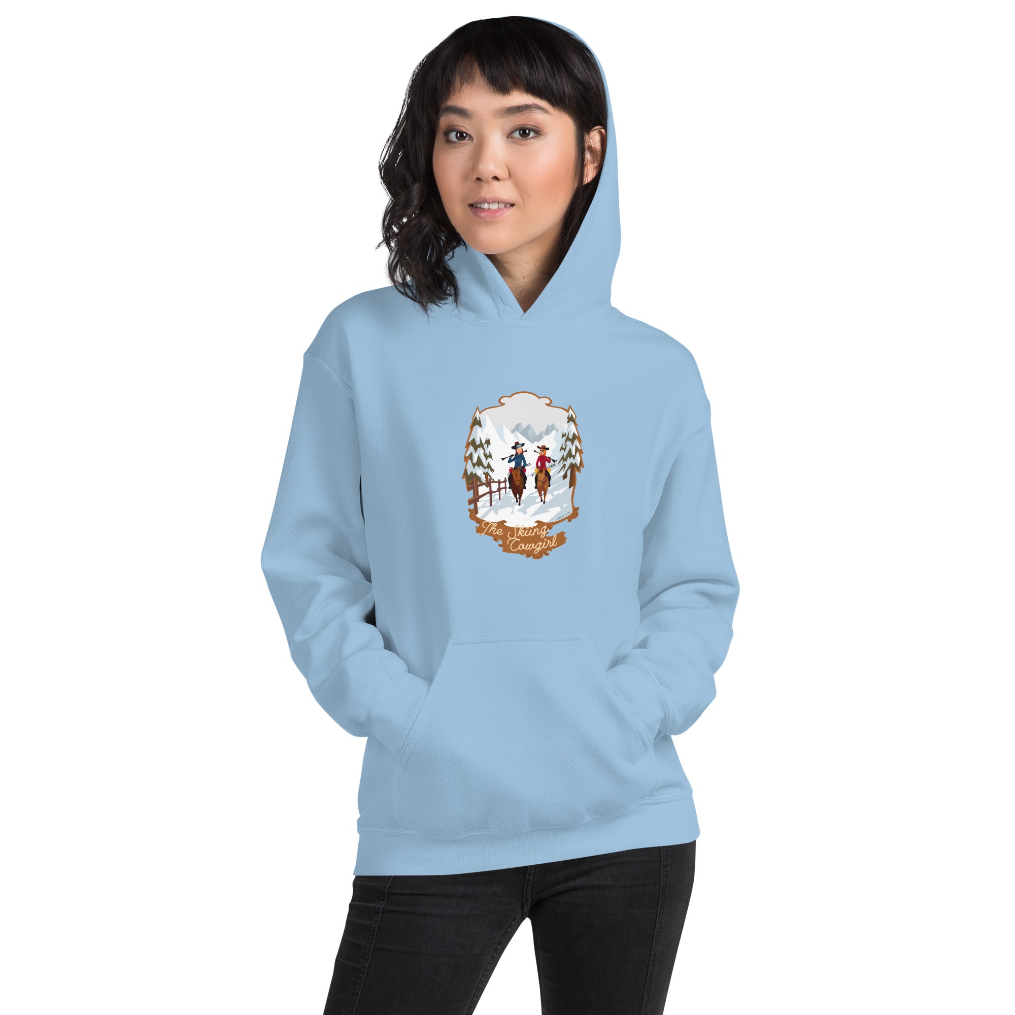 Sweat à capuche d'hiver unisexe The Skiing Cowgirl sur couleurs claires