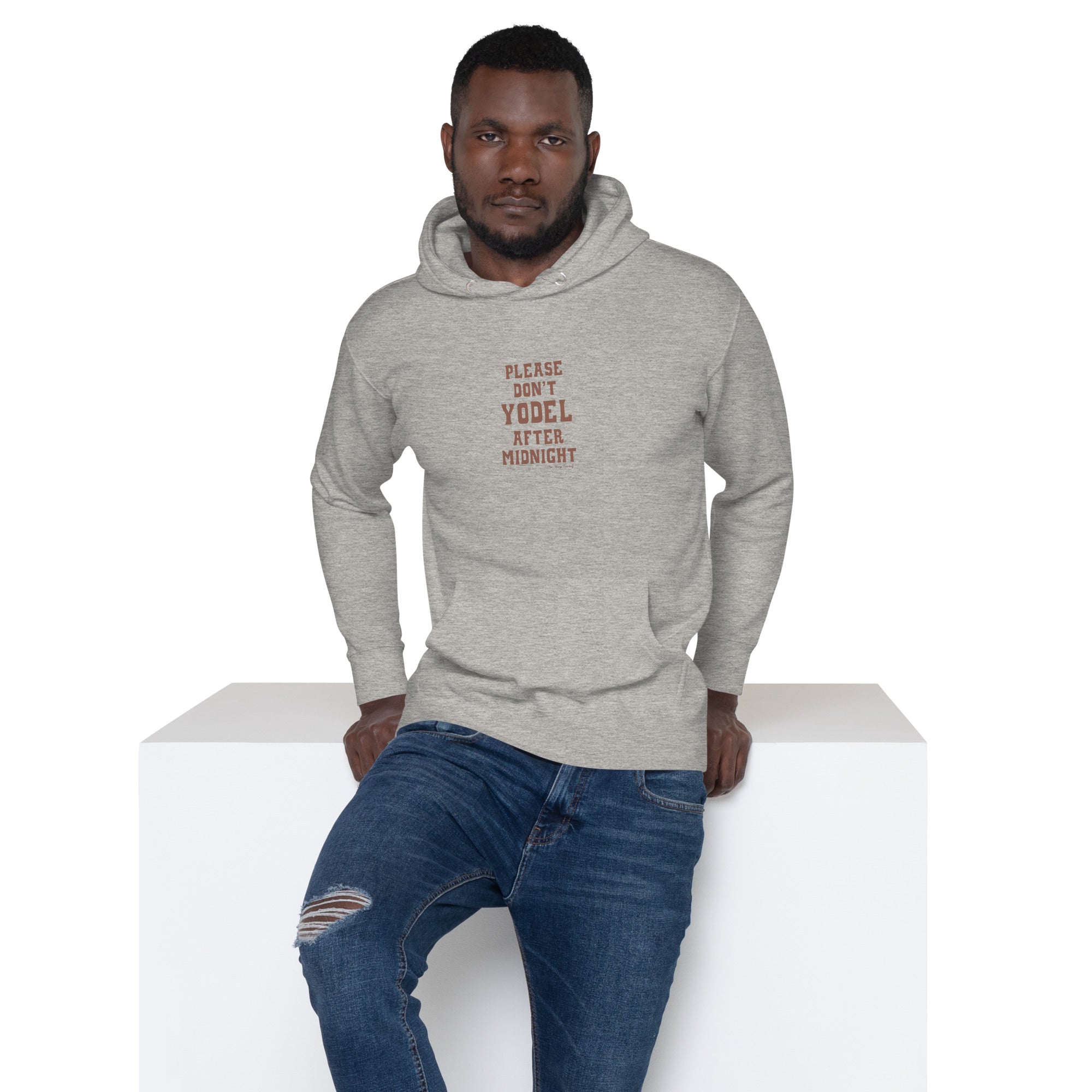 Unisex Cotton Hoodie Don't Yodel After Midnight on light colors