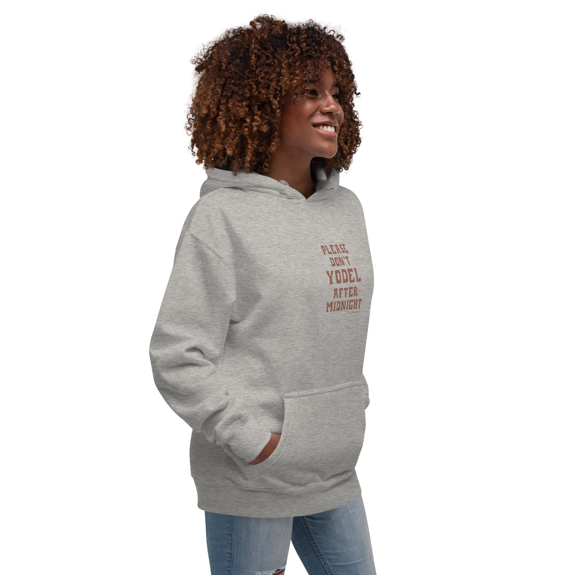 Unisex Cotton Hoodie Don't Yodel After Midnight on light colors