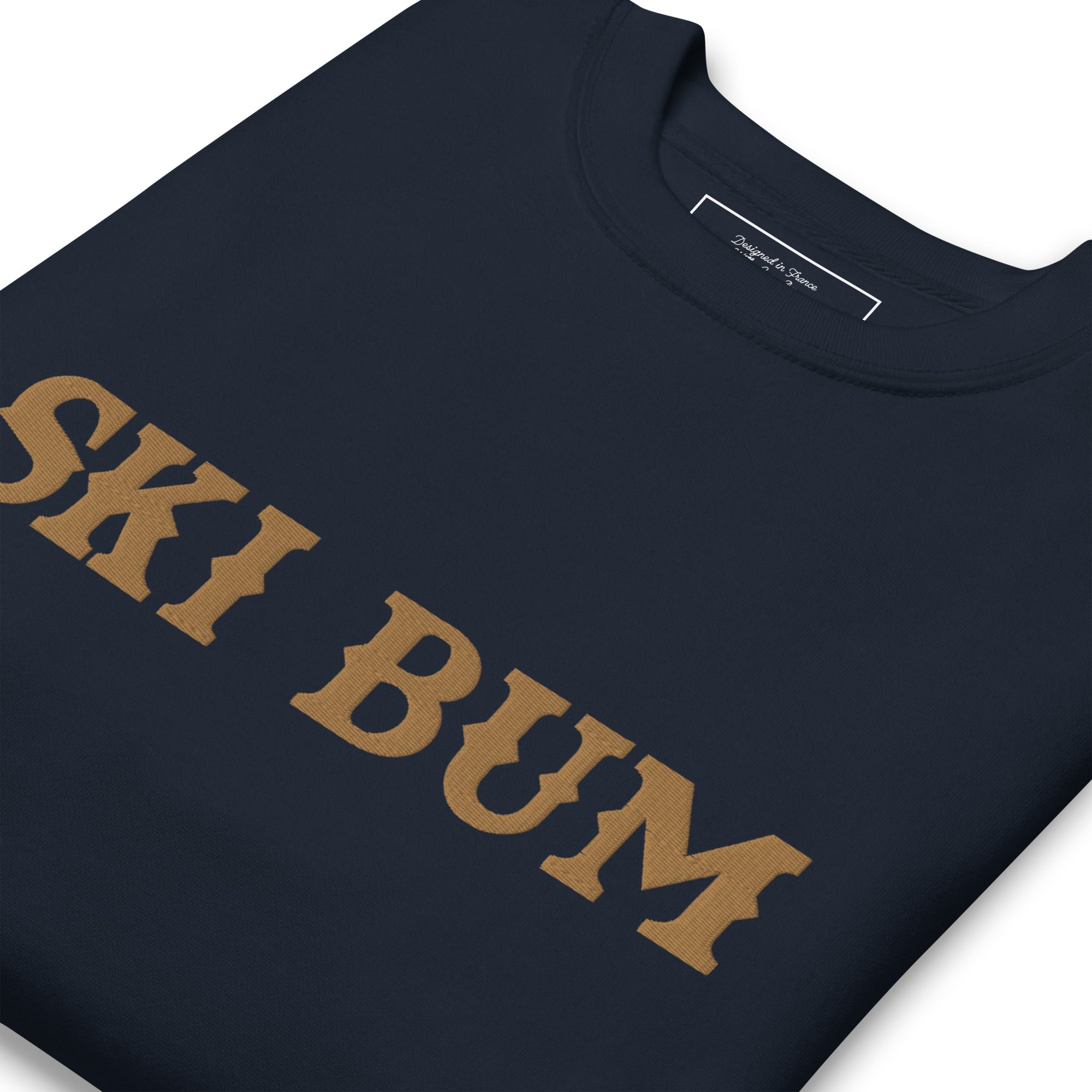 Unisex Premium Sweatshirt Ski Bum Old Gold large embroidered pattern