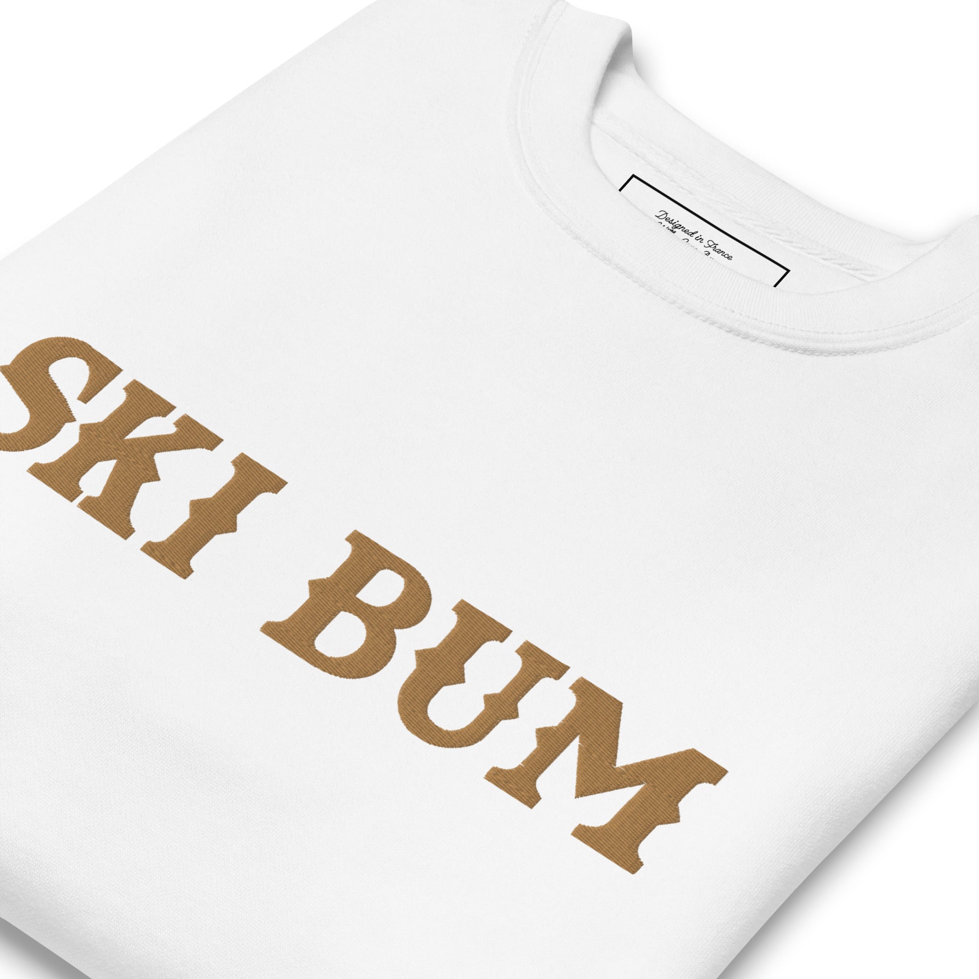 Unisex Premium Sweatshirt Ski Bum Old Gold large embroidered pattern