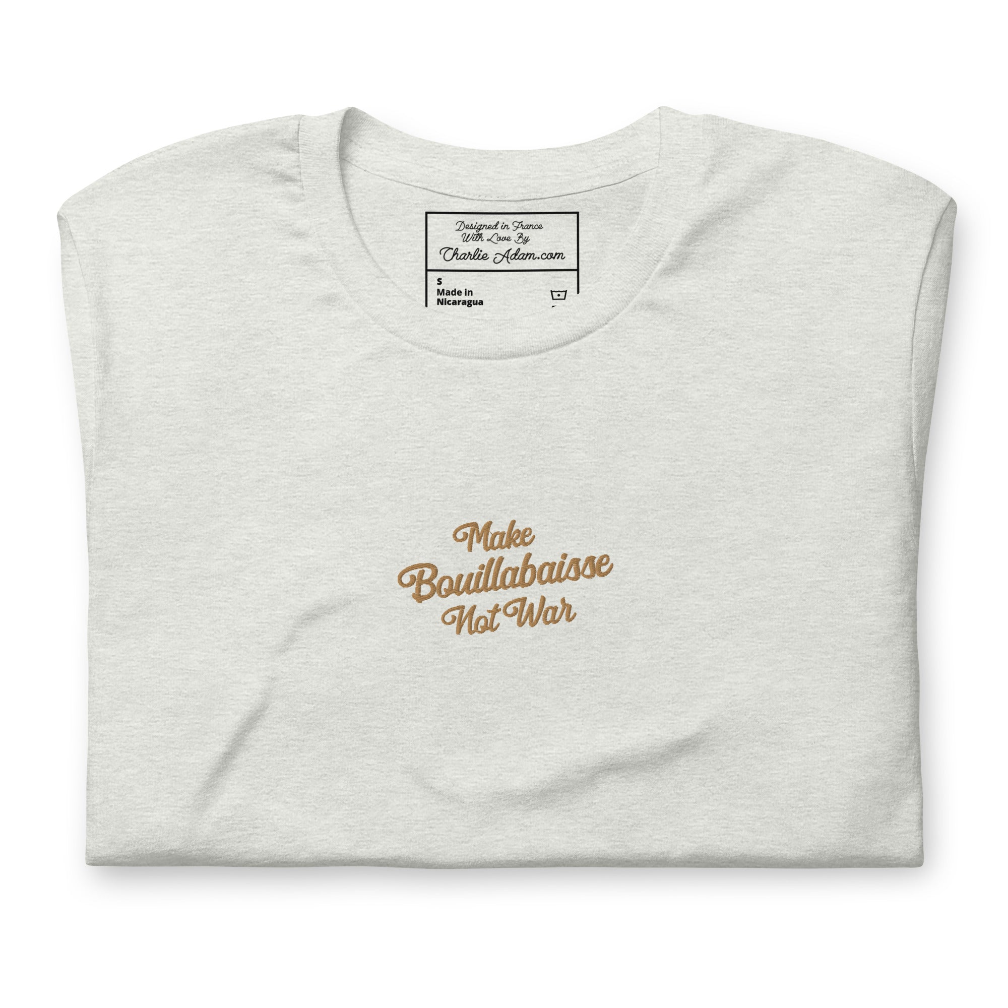 Unisex t-shirt Make Bouillabaisse Not War Text Only old gold embroidered pattern on light heather colors