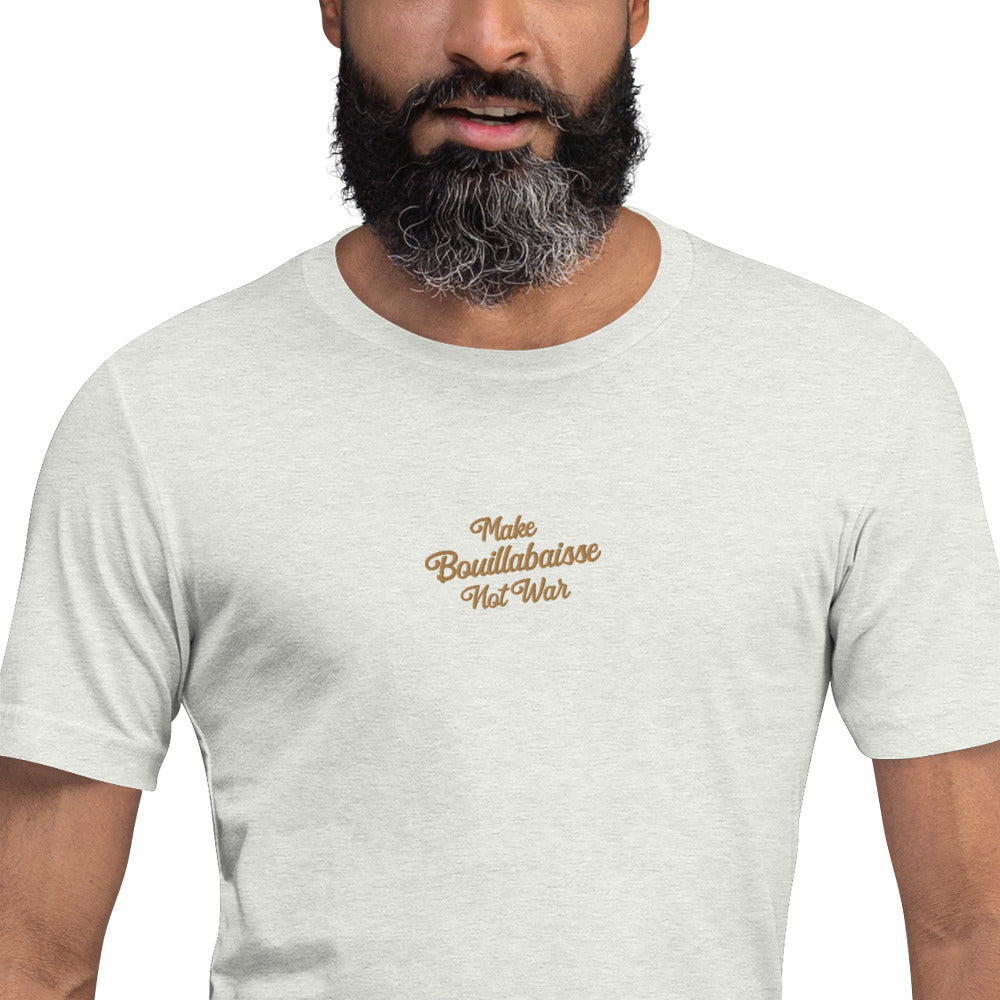 Unisex t-shirt Make Bouillabaisse Not War Text Only old gold embroidered pattern on light heather colors