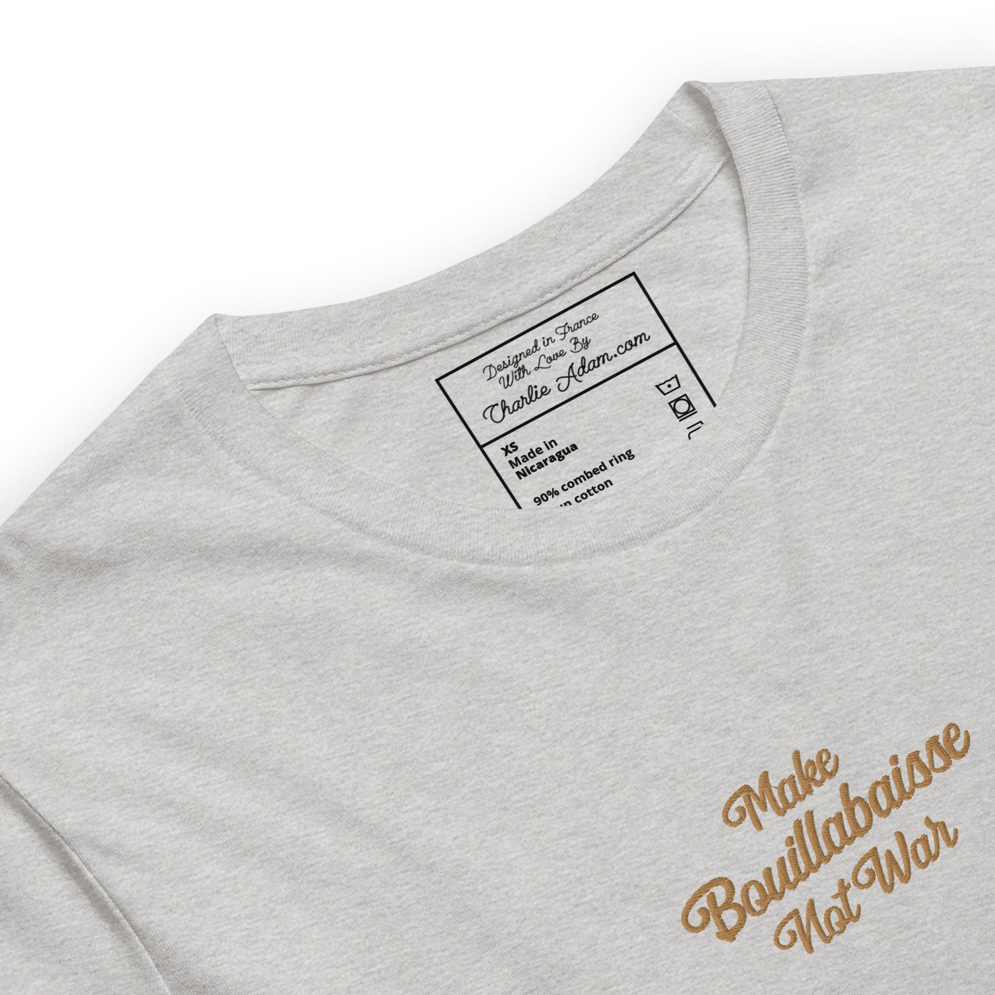 Unisex t-shirt Make Bouillabaisse Not War Text Only old gold embroidered pattern on light heather colors