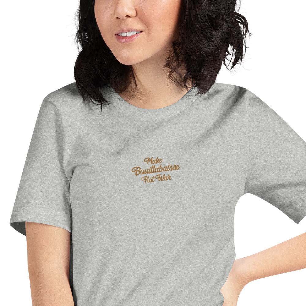 Unisex t-shirt Make Bouillabaisse Not War Text Only old gold embroidered pattern on light heather colors