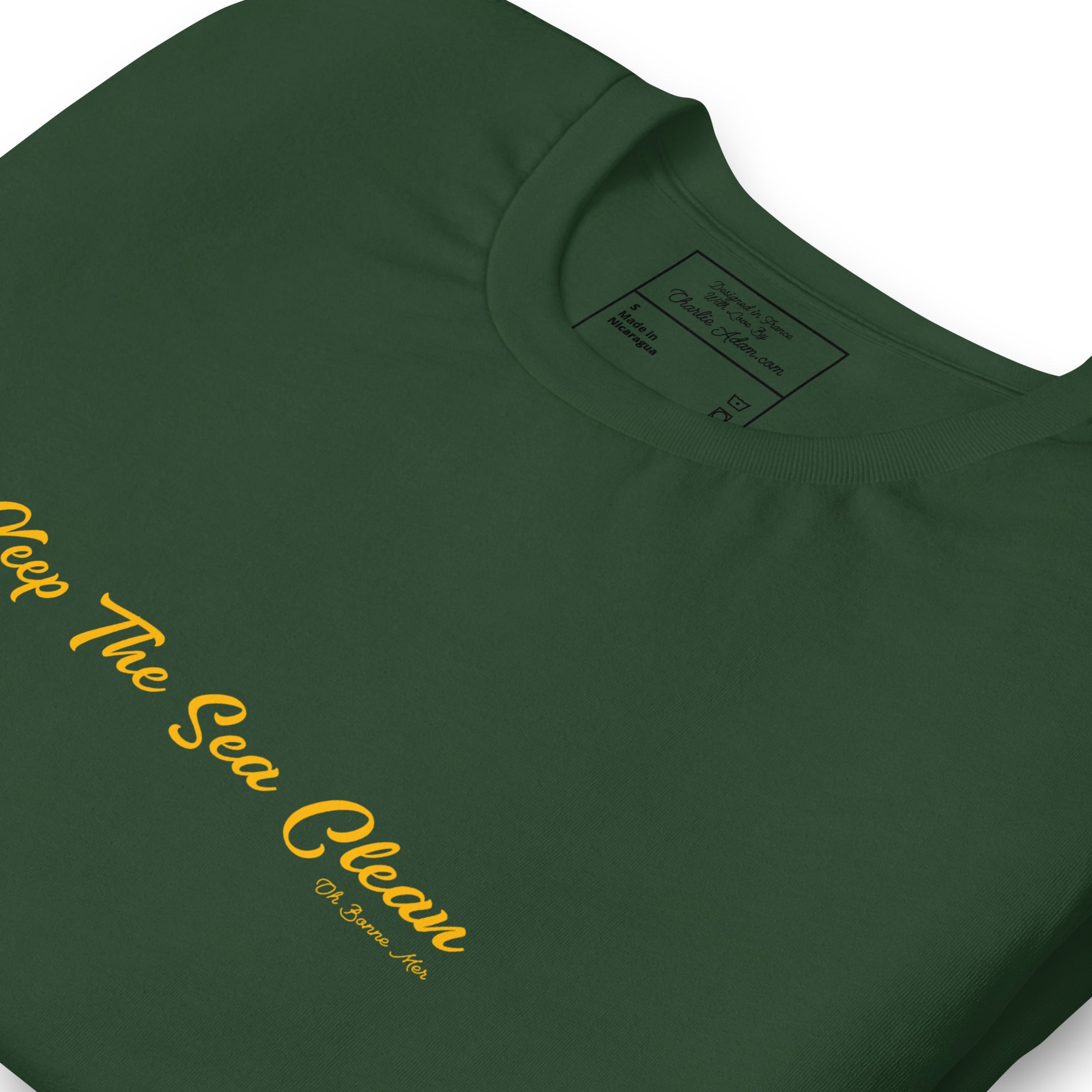 Unisex cotton t-shirt Keep The Sea Clean on greens