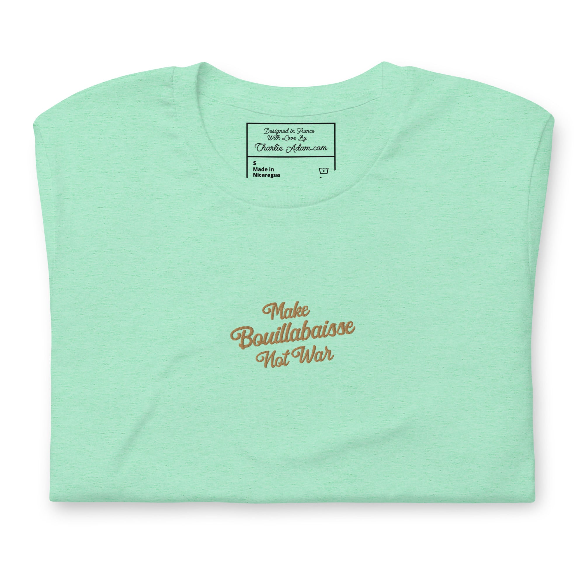 Unisex t-shirt Make Bouillabaisse Not War Text Only old gold embroidered pattern on light heather colors