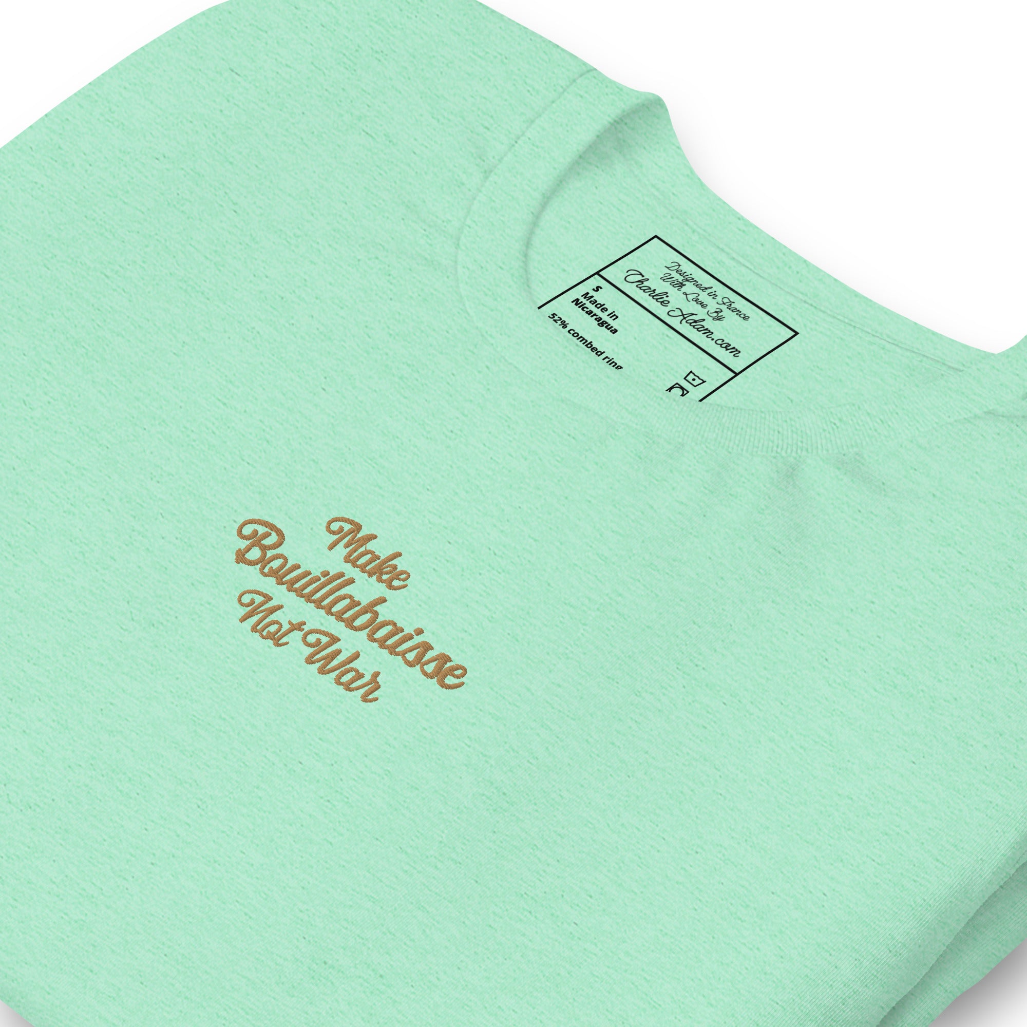 Unisex t-shirt Make Bouillabaisse Not War Text Only old gold embroidered pattern on light heather colors