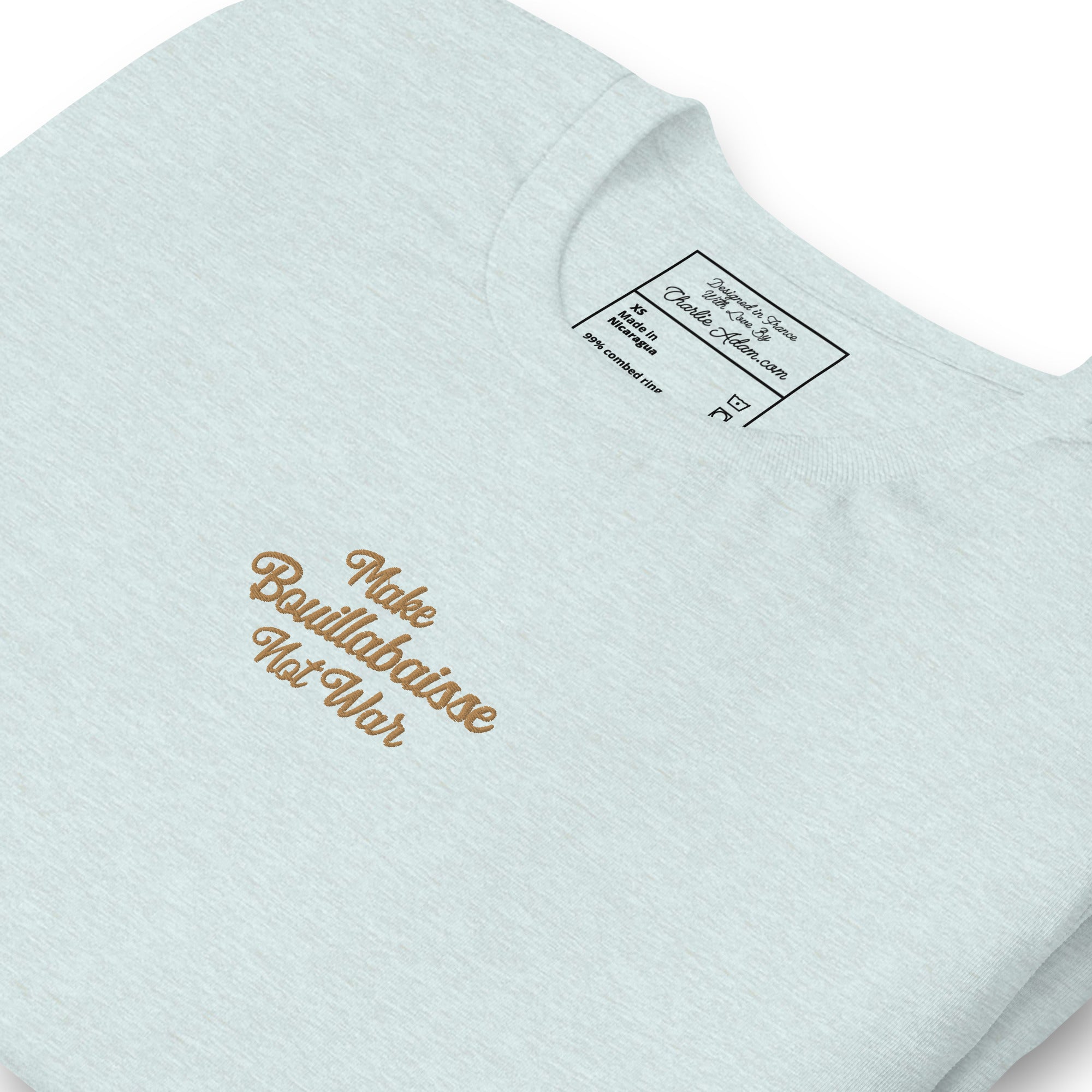 Unisex t-shirt Make Bouillabaisse Not War Text Only old gold embroidered pattern on light heather colors