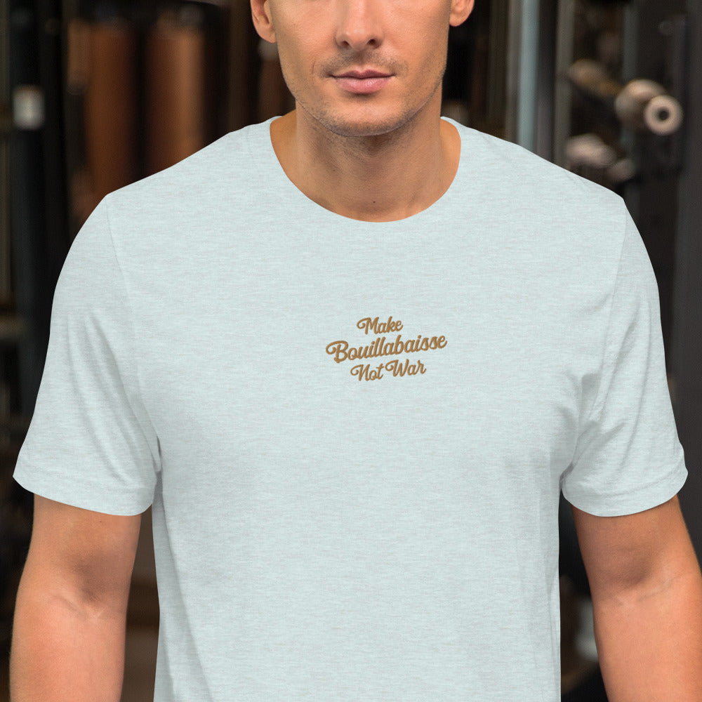 Unisex t-shirt Make Bouillabaisse Not War Text Only old gold embroidered pattern on light heather colors