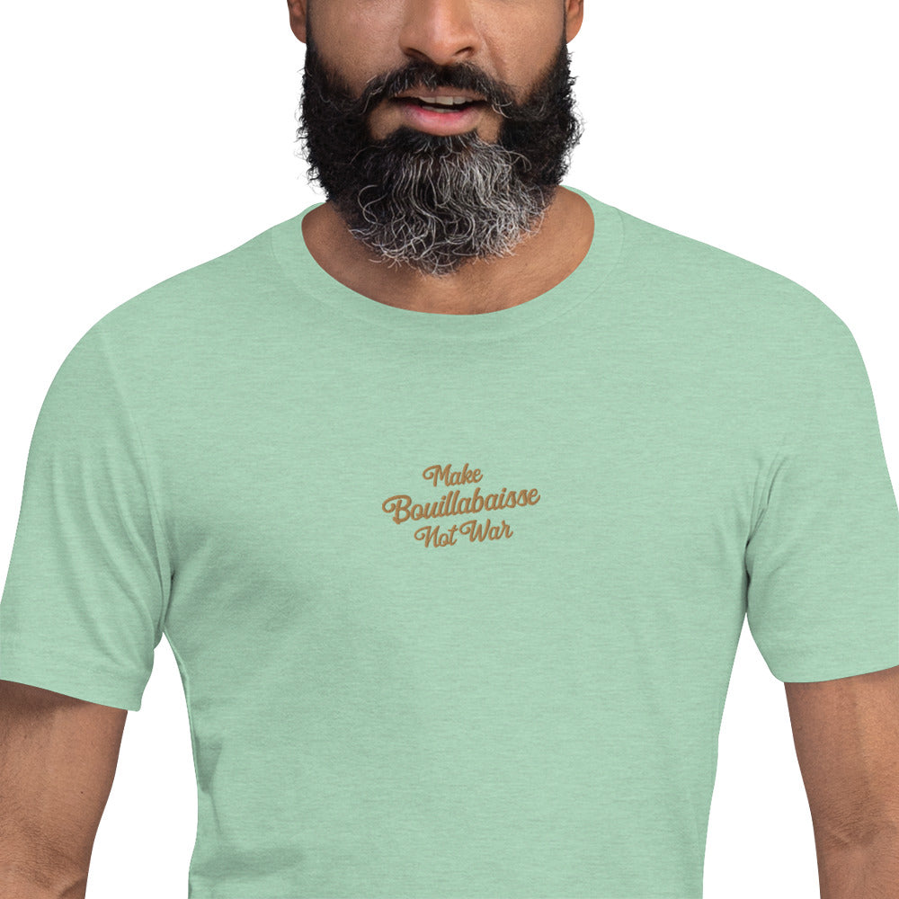 Unisex t-shirt Make Bouillabaisse Not War Text Only old gold embroidered pattern on light heather colors