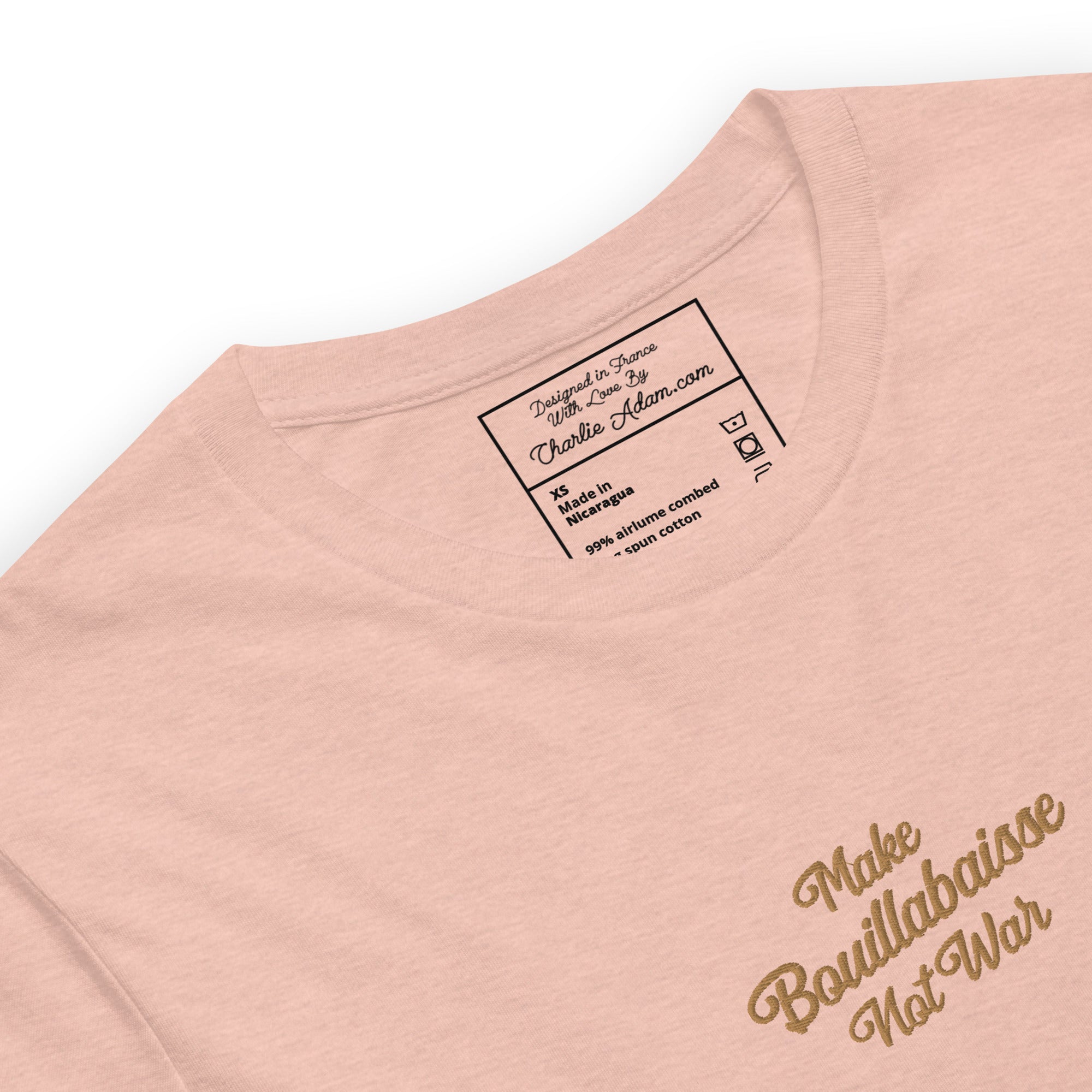 Unisex t-shirt Make Bouillabaisse Not War Text Only old gold embroidered pattern on light heather colors