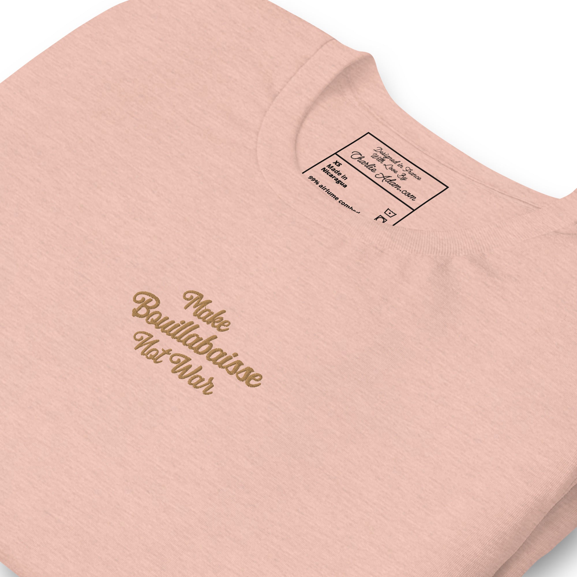 Unisex t-shirt Make Bouillabaisse Not War Text Only old gold embroidered pattern on light heather colors