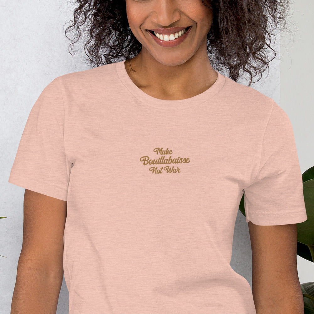 Unisex t-shirt Make Bouillabaisse Not War Text Only old gold embroidered pattern on light heather colors