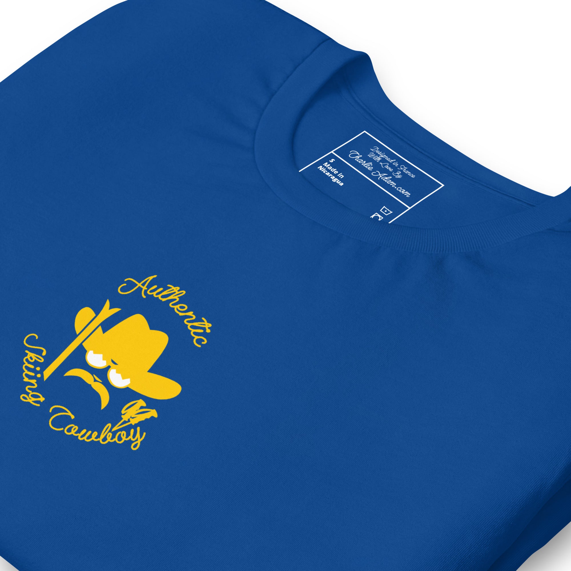 T-shirt en coton unisexe Authentic Skiing Cowboy doré sur couleurs foncées