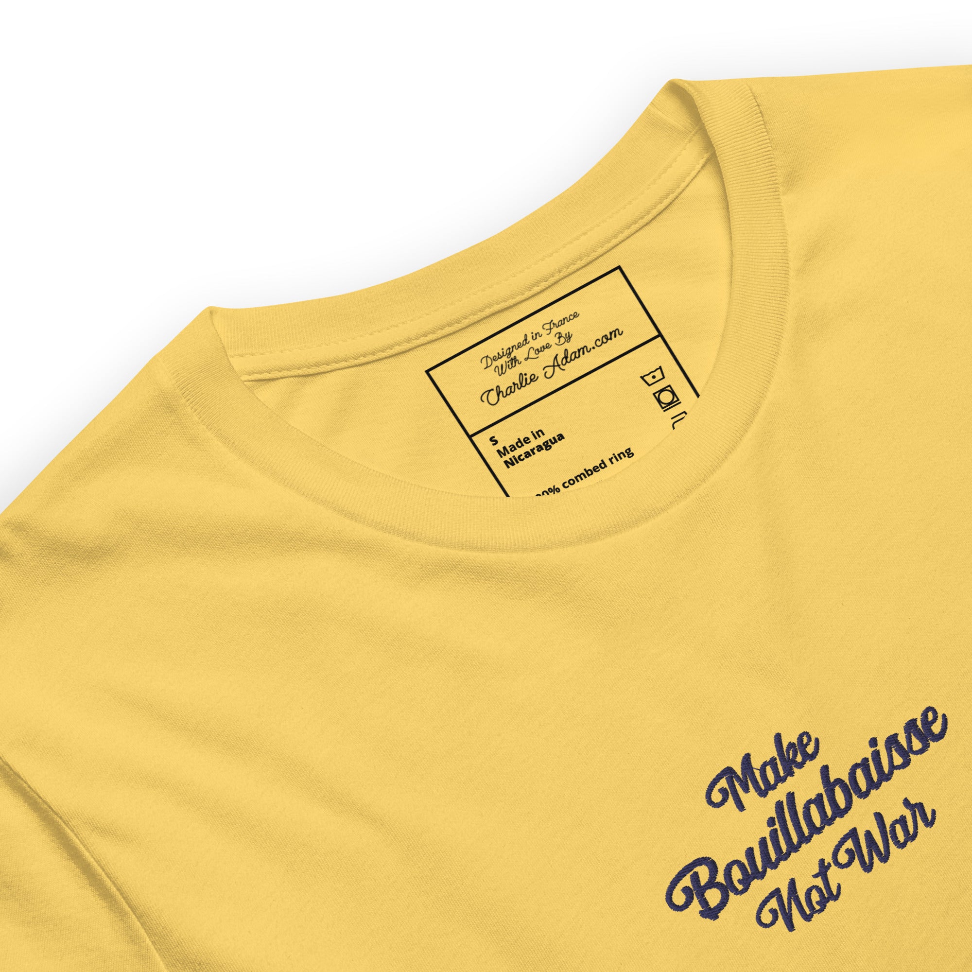 Unisex t-shirt Make Bouillabaisse Not War Text Only navy on bright colors