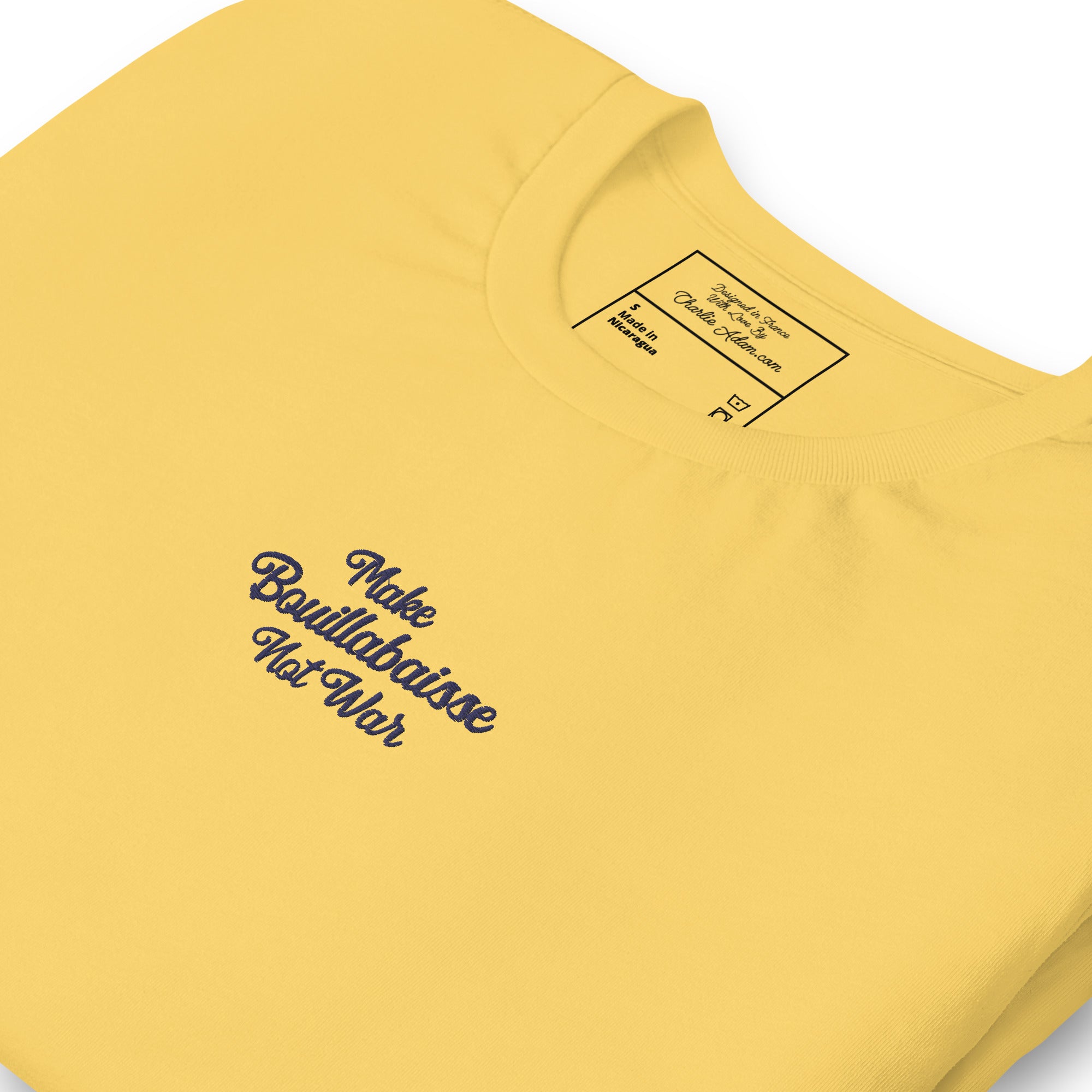 Unisex t-shirt Make Bouillabaisse Not War Text Only navy on bright colors