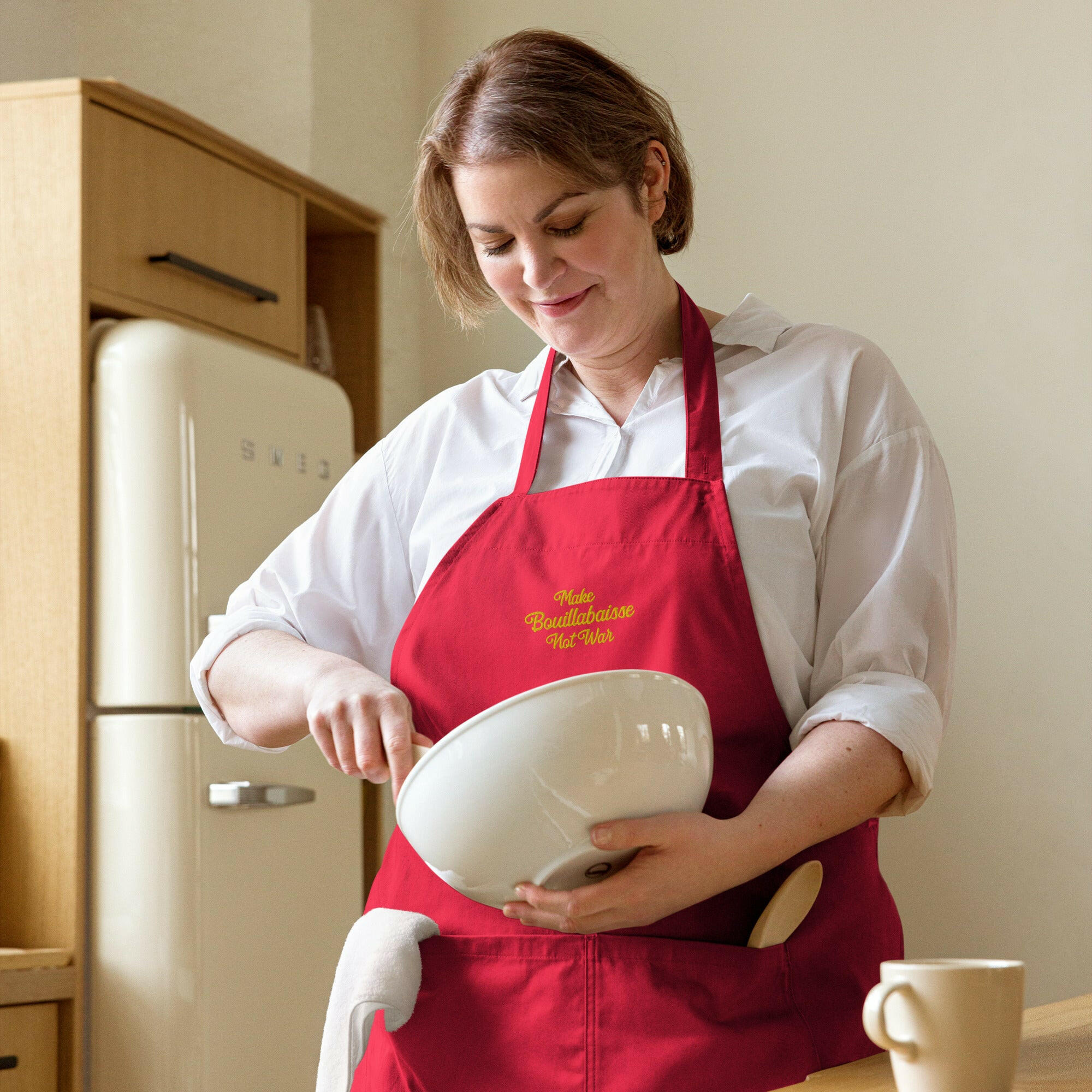 Organic cotton apron Make Bouillabaisse Not War Embroidered pattern