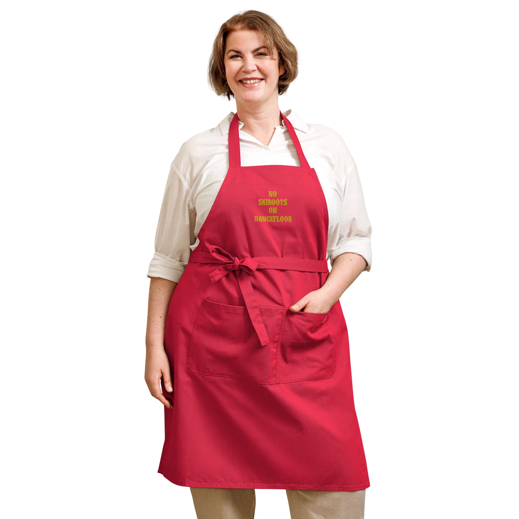 Organic cotton apron No Skiboots on Dancefloor gold embroidered pattern