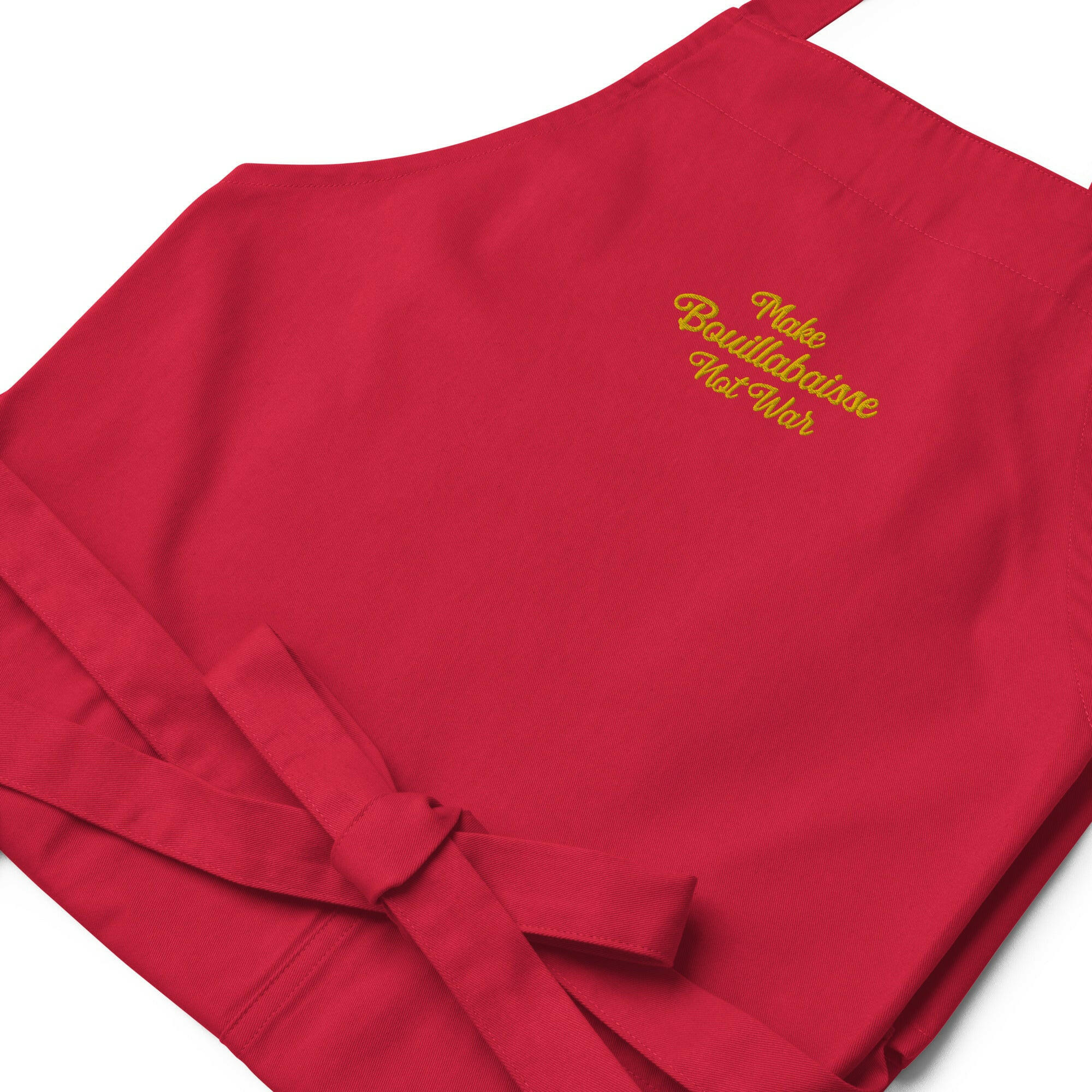 Organic cotton apron Make Bouillabaisse Not War Embroidered pattern