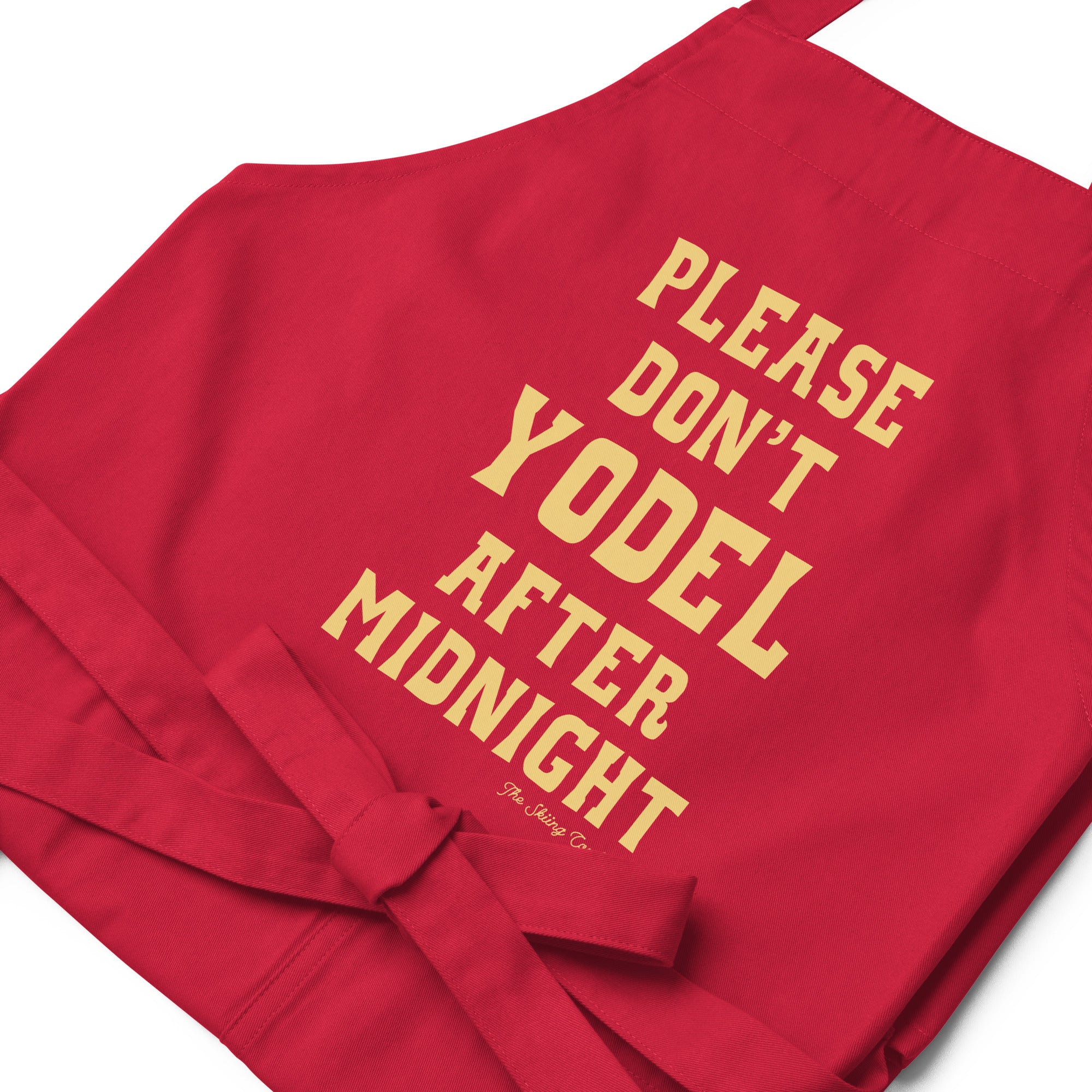 Organic cotton apron Don't Yodel After Midnight light text