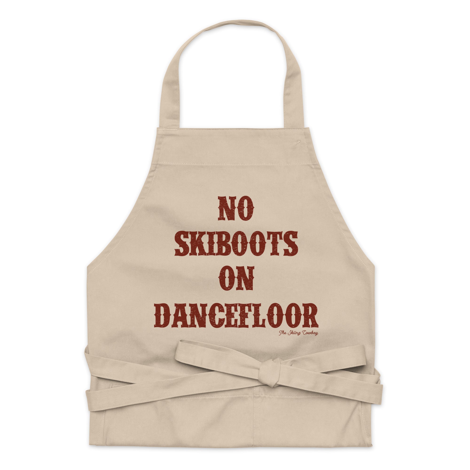 Tablier en coton biologique No Skiboots on Dancefloor sur fond clair