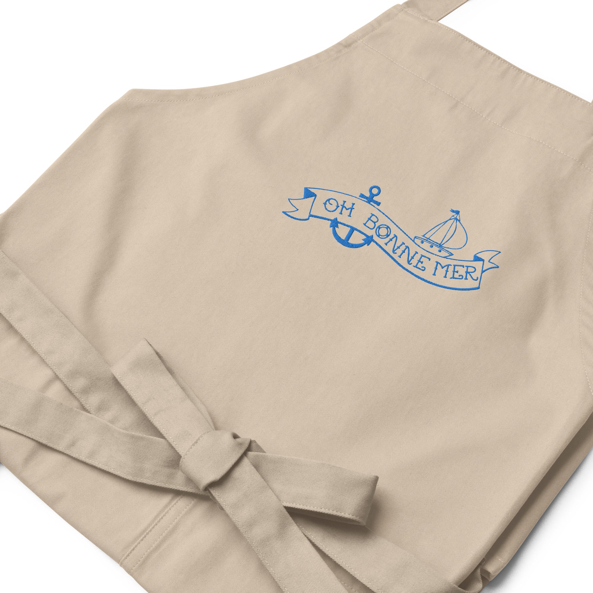 Organic cotton apron Oh Bonne Mer Tattoo blue avio embroidered pattern