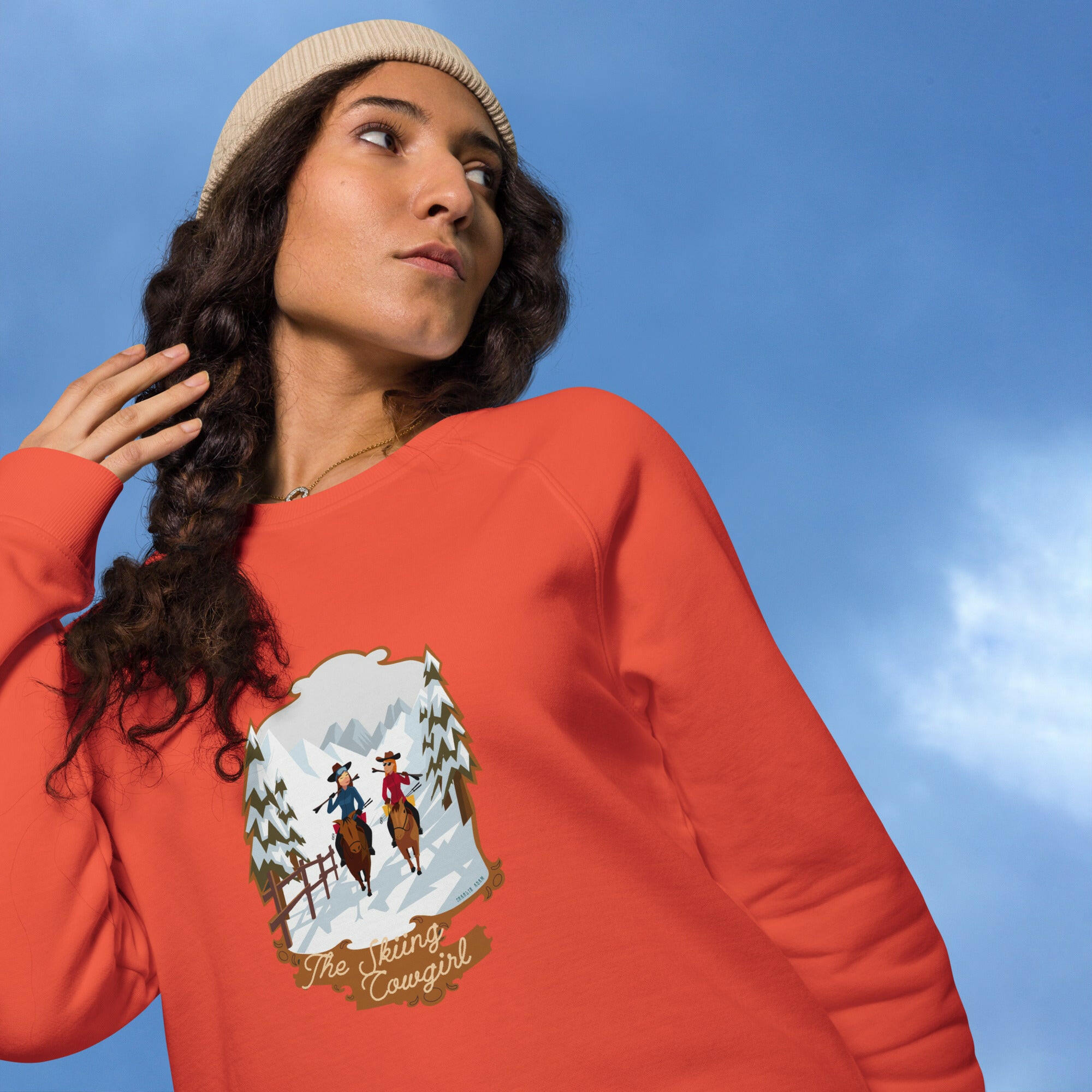 Unisex organic raglan sweatshirt The Skiing Cowgirl