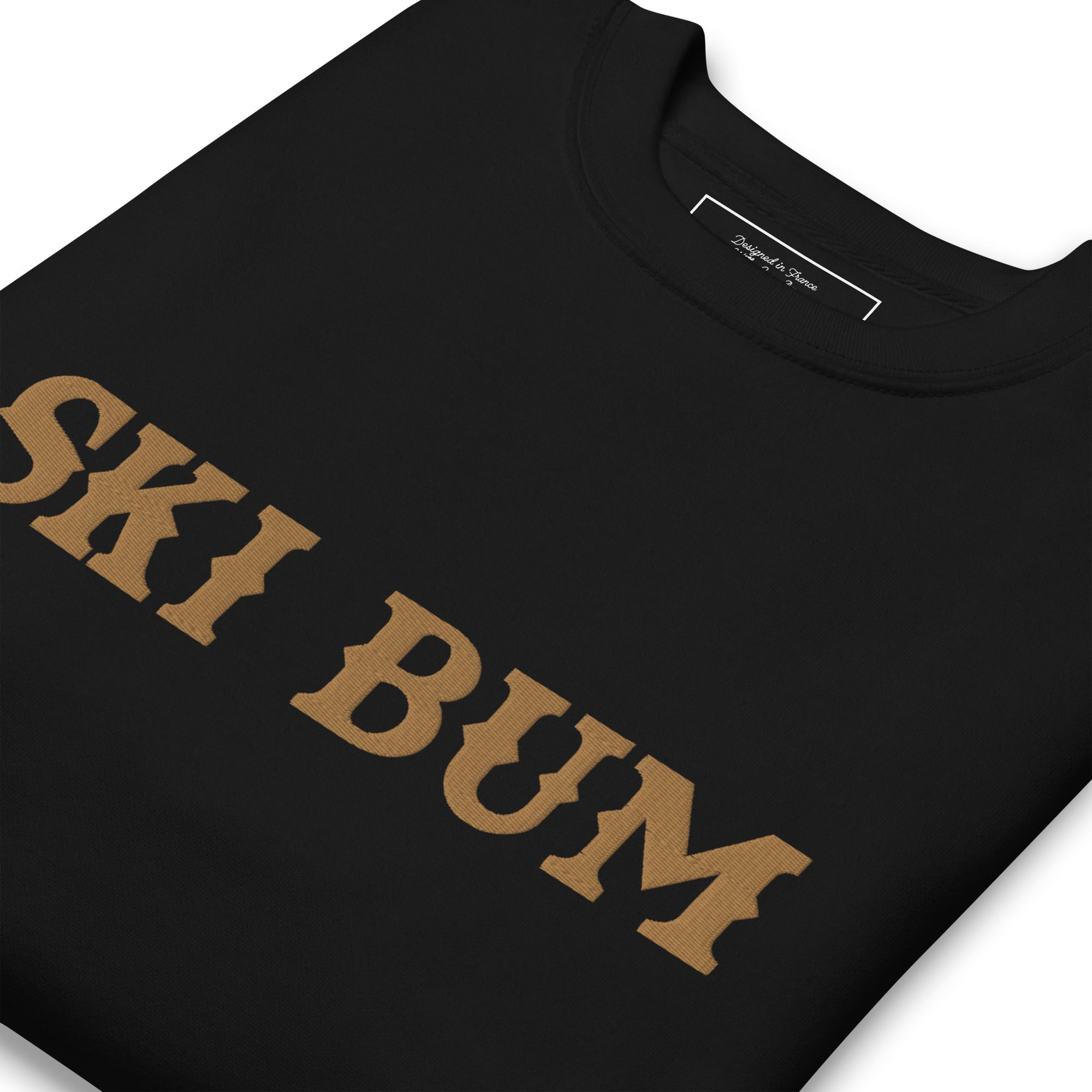 Unisex Premium Sweatshirt Ski Bum Old Gold large embroidered pattern