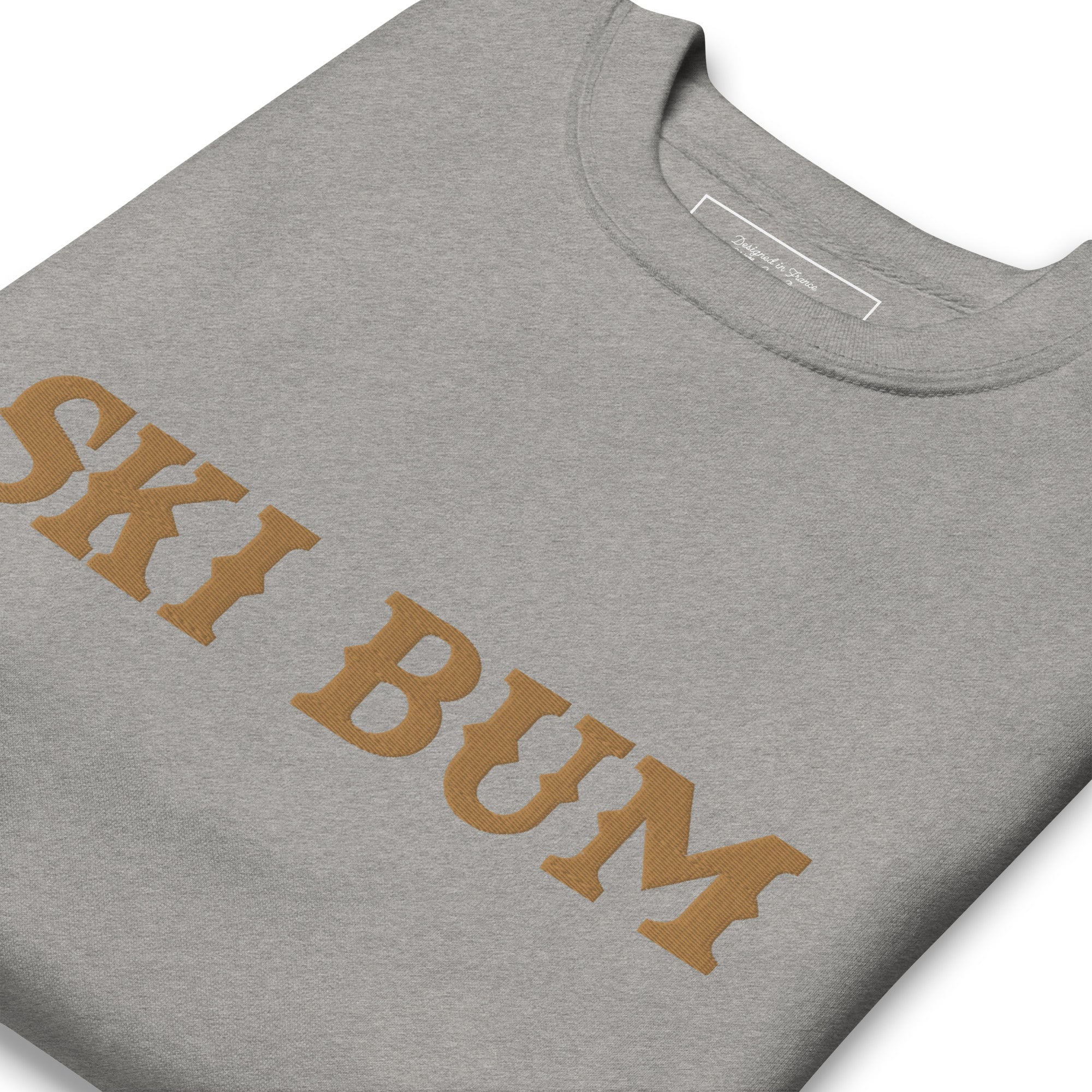 Unisex Premium Sweatshirt Ski Bum Old Gold large embroidered pattern