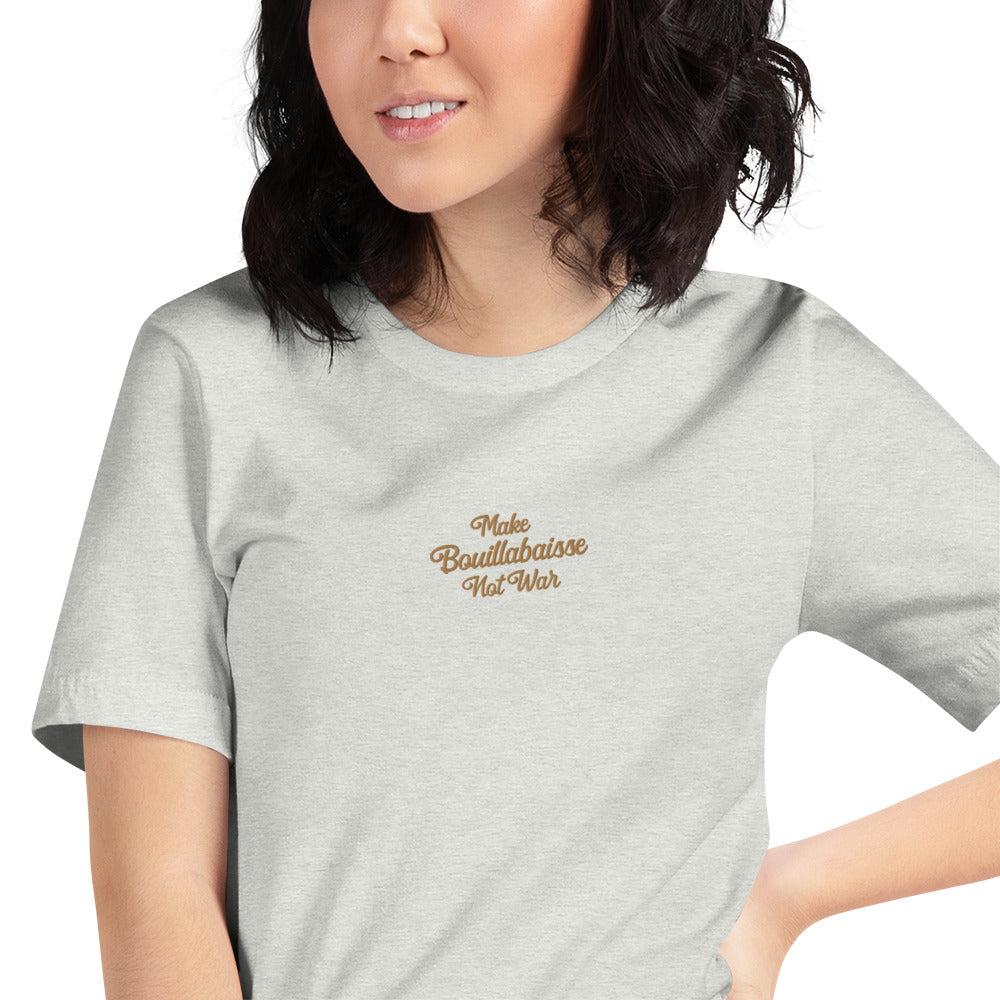 Unisex t-shirt Make Bouillabaisse Not War Text Only old gold embroidered pattern on light heather colors