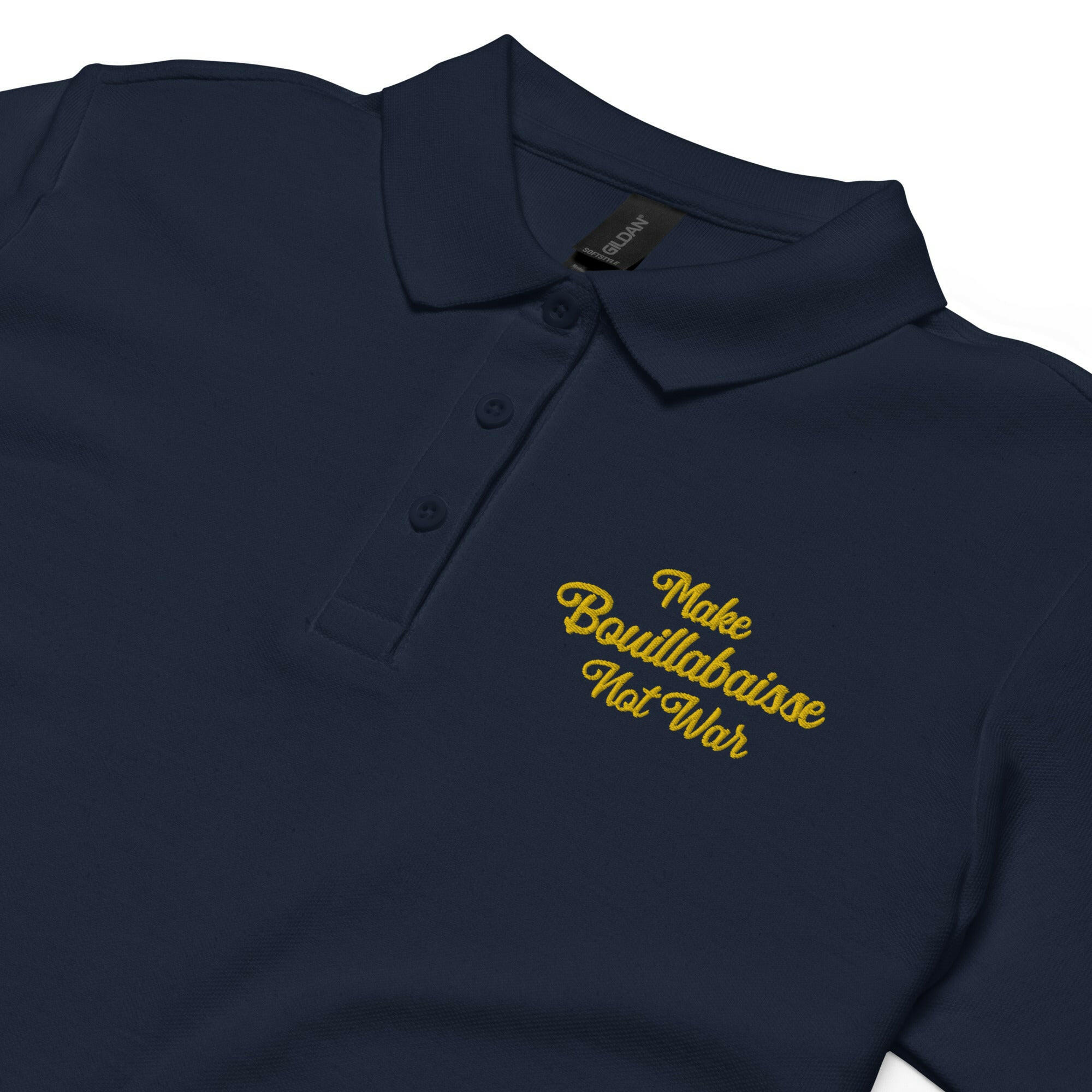 Women’s pique polo shirt Make Bouillabaisse Not War embroidered pattern